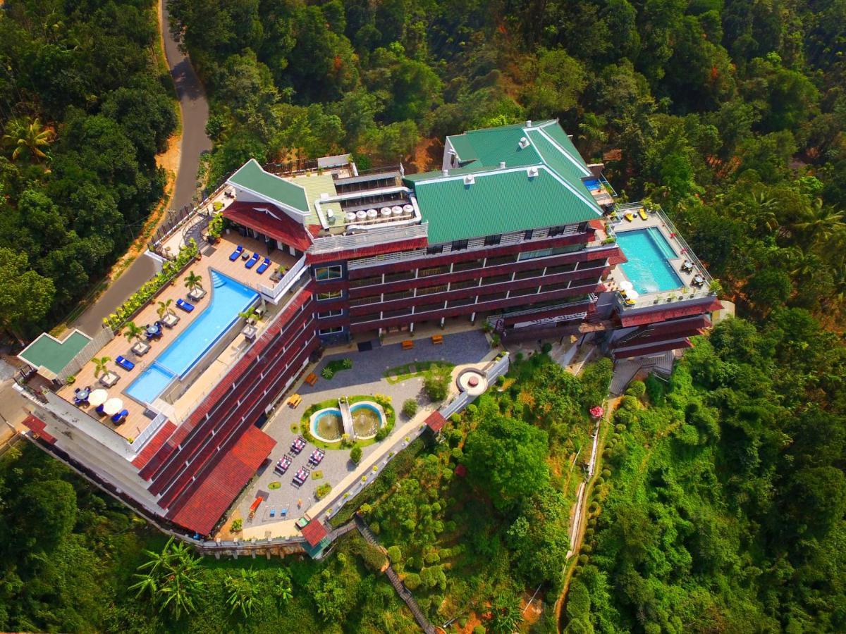 The Panoramic Getaway Hotel Мунар Екстериор снимка Aerial view of the hotel