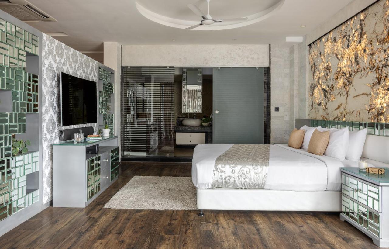 The Panoramic Getaway Hotel Мунар Екстериор снимка A bedroom at the hotel