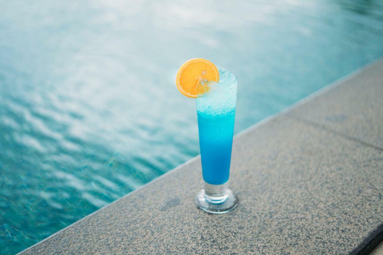 The Panoramic Getaway Hotel Мунар Екстериор снимка Blue Hawaii